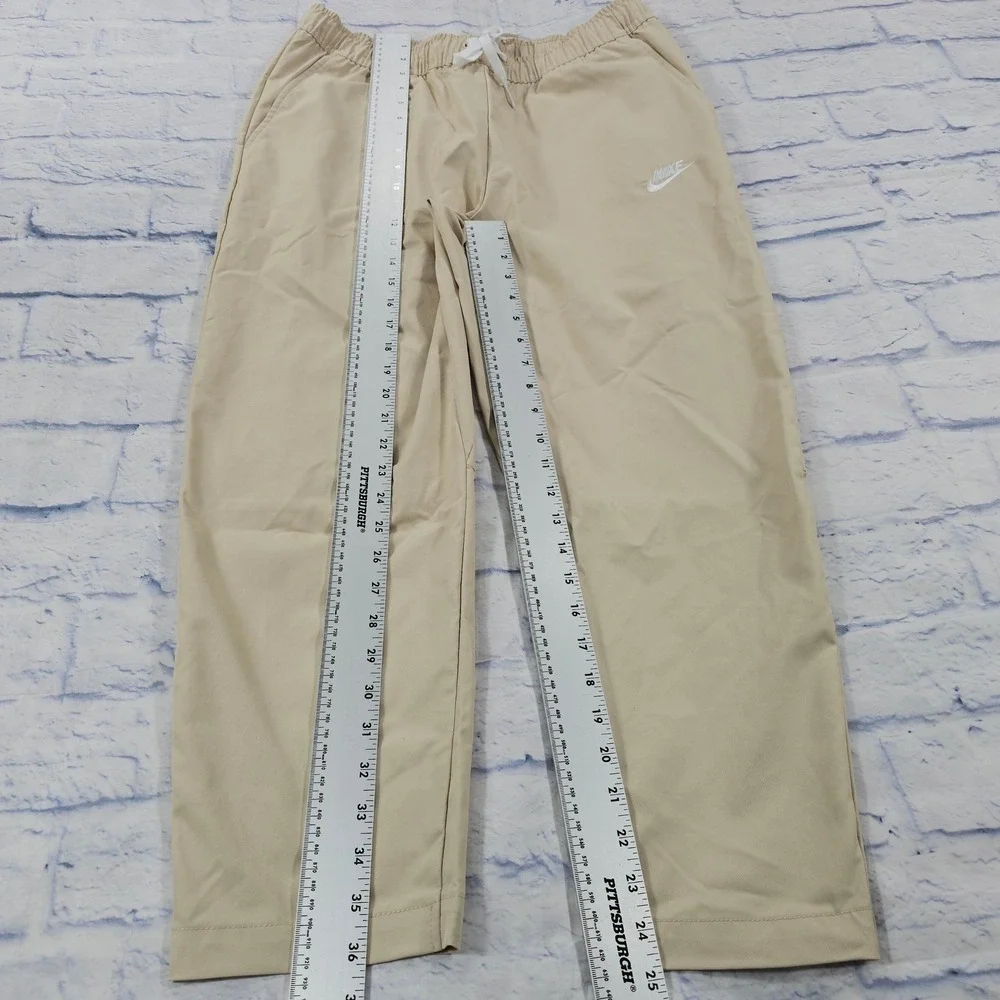 Nike Club Woven Pants Mens M Khaki Beige Elastic Waist Drawstring Casual Sport